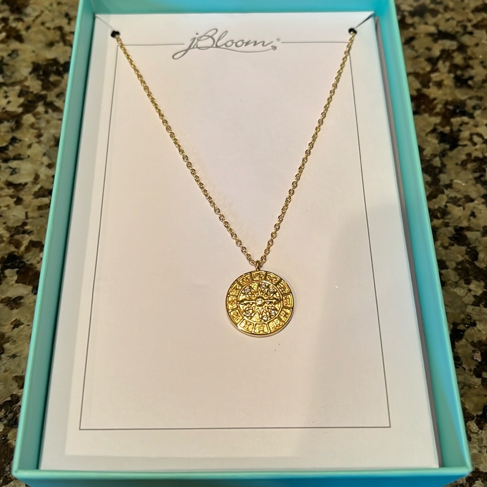 JBloom zodiac necklace in box. Brand new. Never worn. Ready for gift giving!